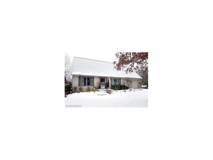 Beautiful Cape Cod nestled in 5 acre wooded settin