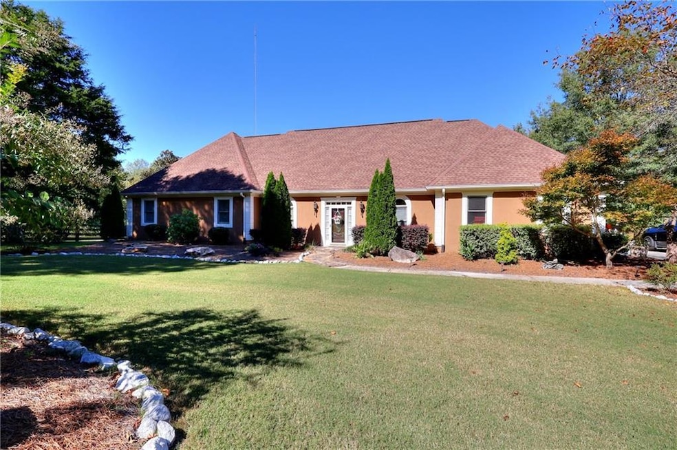 View of front of property featuring a front lawn