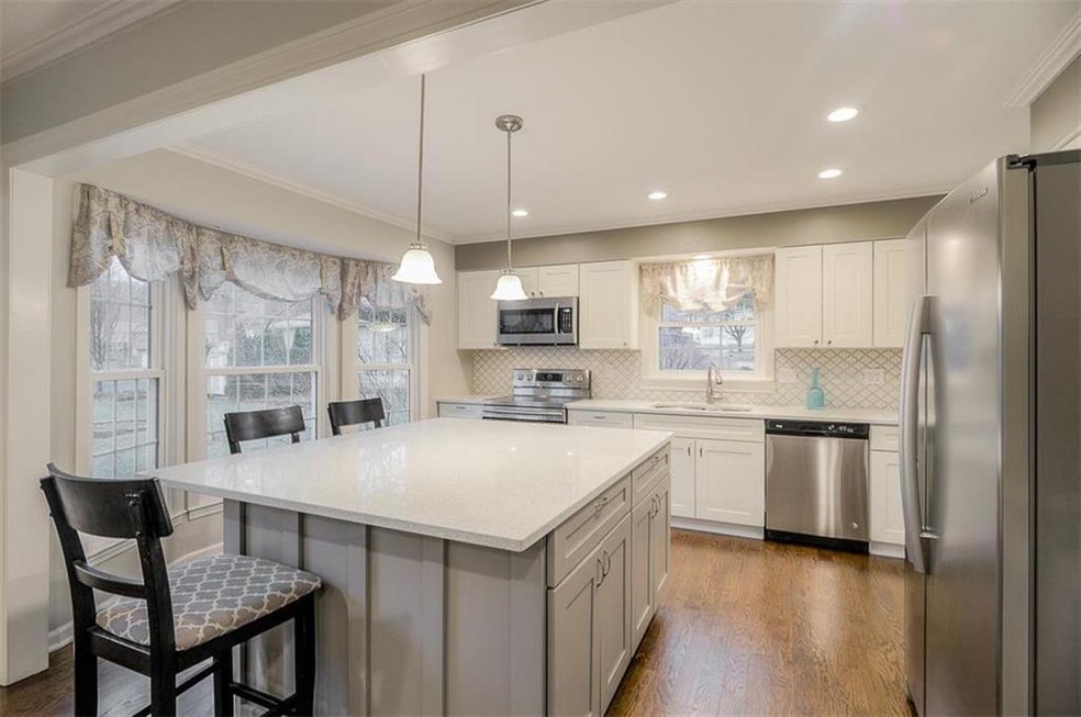Light and bright, this kitchen gleams with sparkli