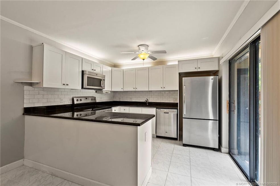 6143 SE Windsong Ln unit 1025, Stuart, FL 34997 - photo 1
