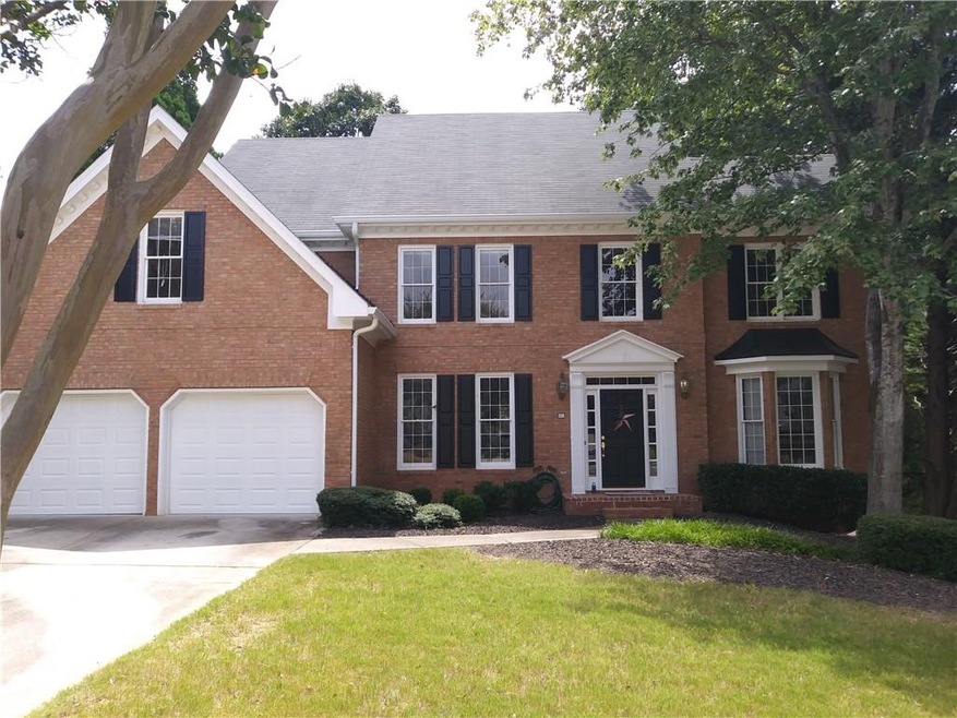 Stately 4-sided brick home in the sought after Tux