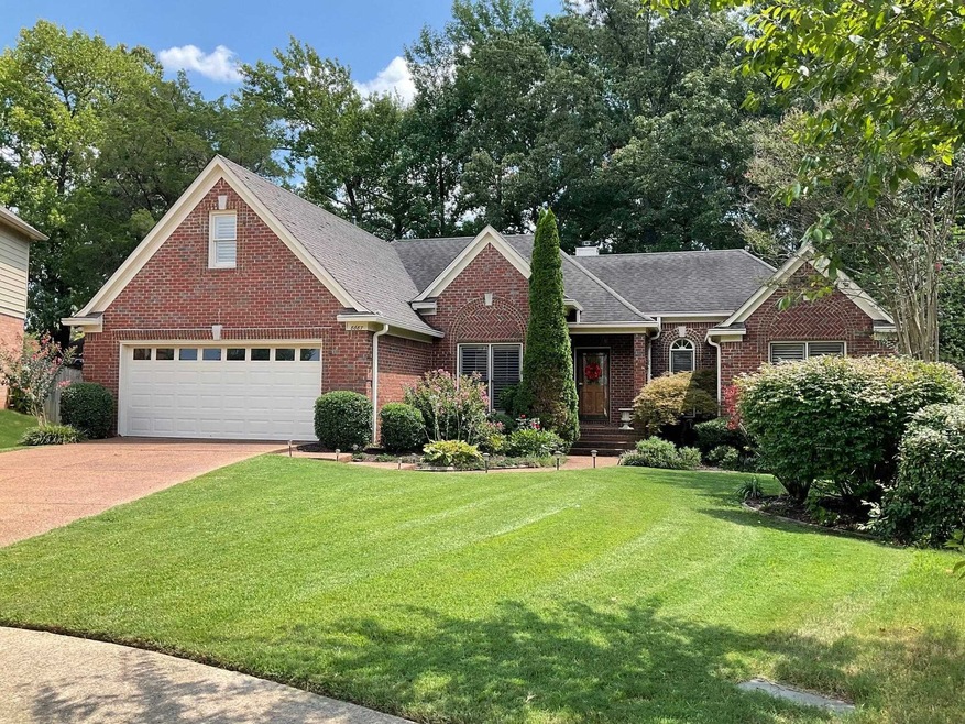 View of front of home featuring a garage and a fro