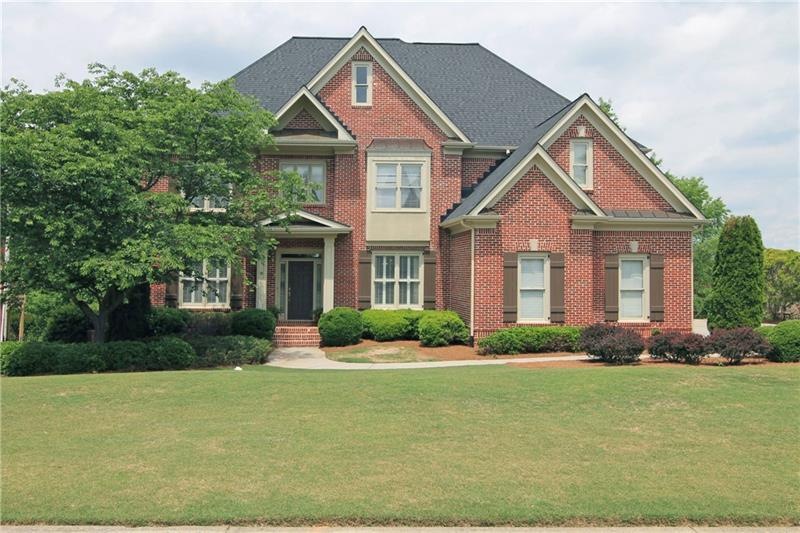 Front of Home with 3 Car Side Entry Garage