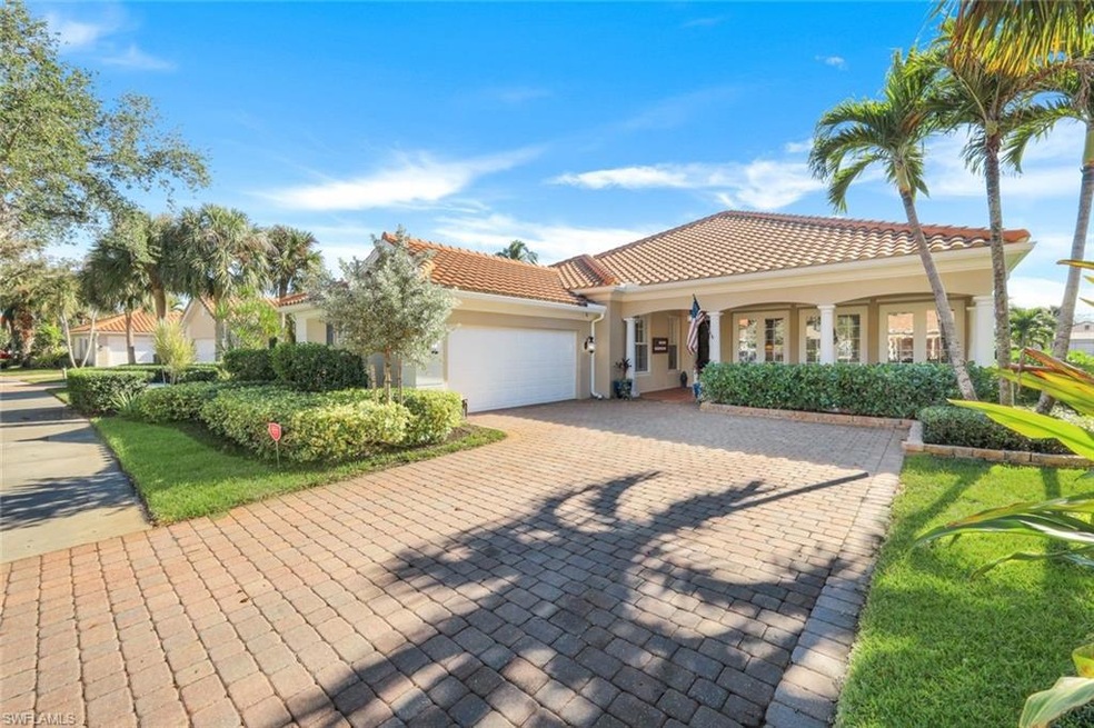 Mediterranean / spanish-style house featuring a ga
