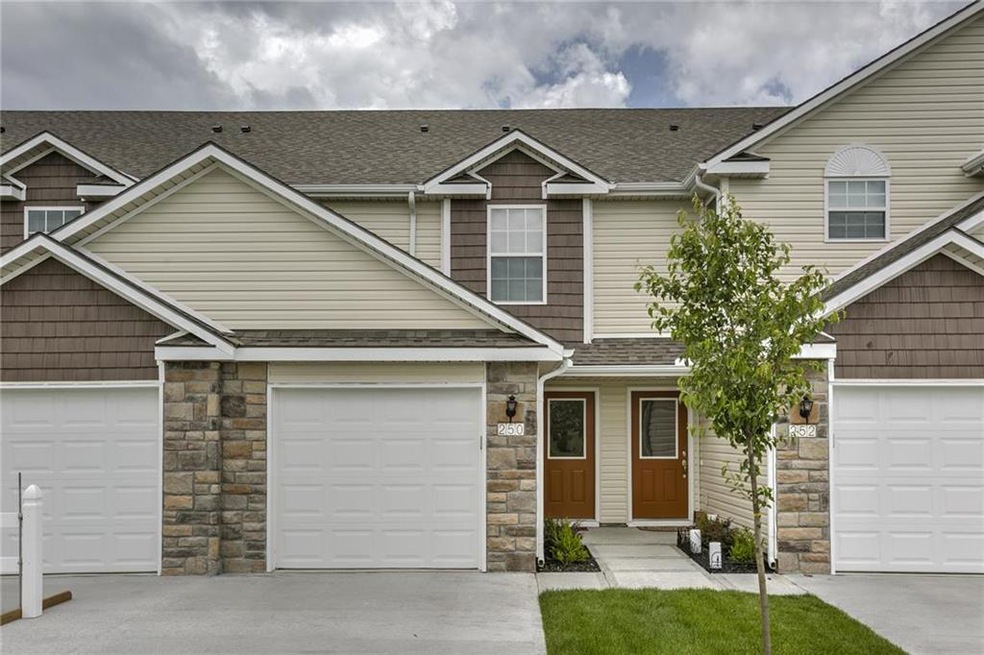 235 Pointe Ln, Raymore, MO 64083 - photo 1