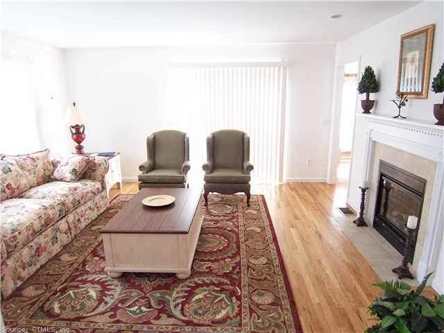 Living Room. Gleaming oak floor, fireplace