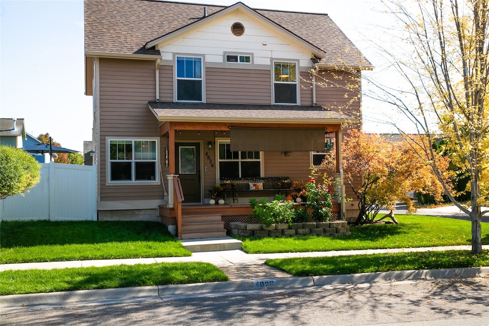 View of front of house featuring covered porch and roof with shingles