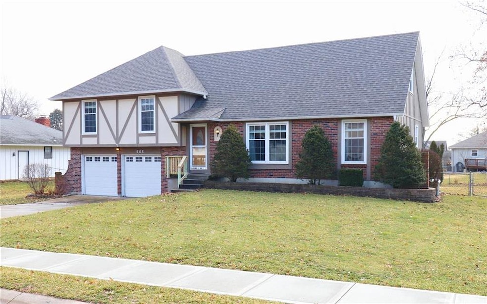 505 W Maple St, Raymore, MO 64083 - photo 1