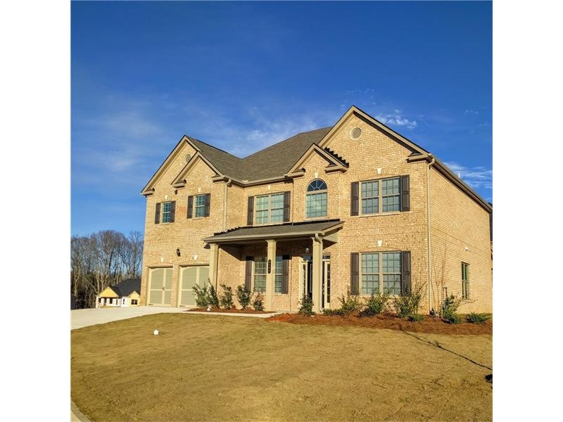 Four sides brick in a culdesac with a covered porc