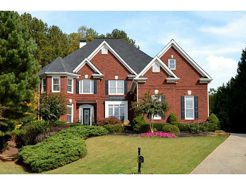 Exterior Front. Traditional brick beauty sitting o