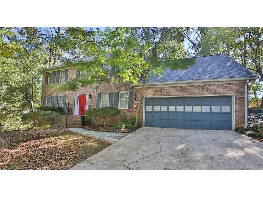 Beautiful curb appeal for this traditional brick a