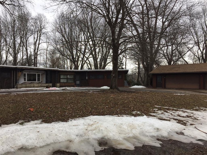 Front exterior and detached garage