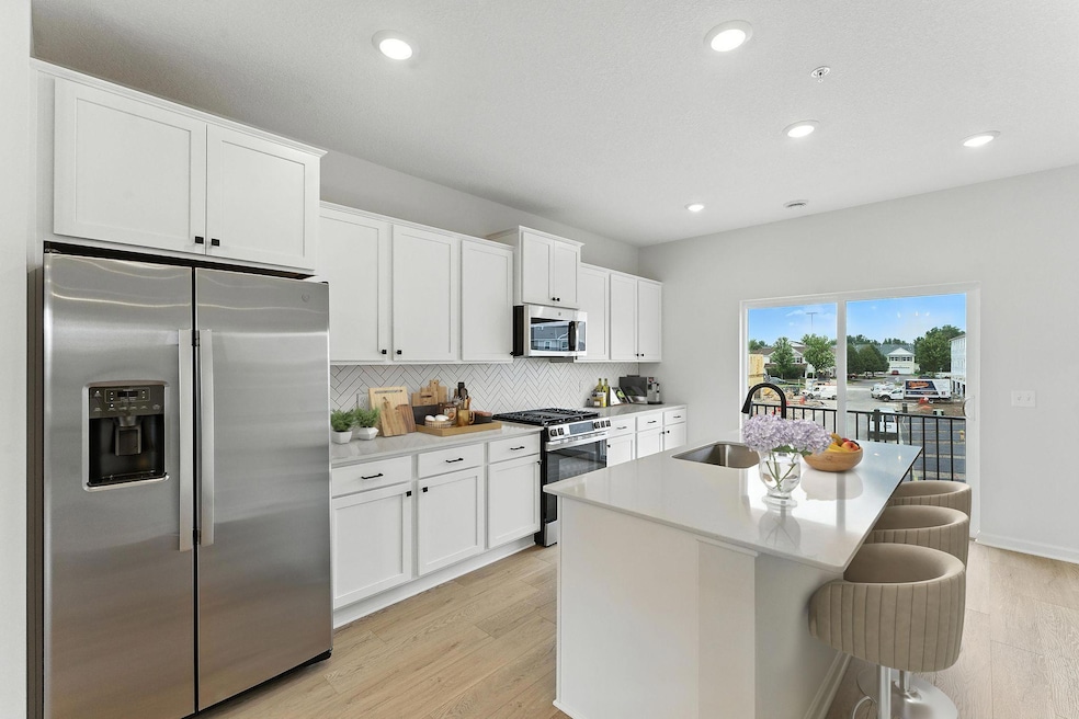 Light and bright! The kitchen has timeless finishes that blend an elevated feel with functionality.
