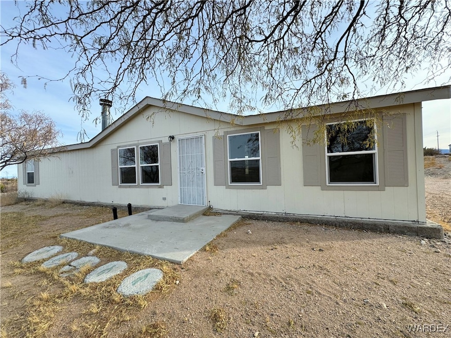 View of front of house with a patio area