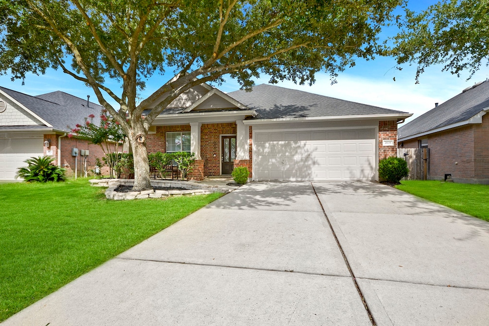 Stunning brick elevation with 2 car garage. Upgraded front door. Make your appointment and come on in!!