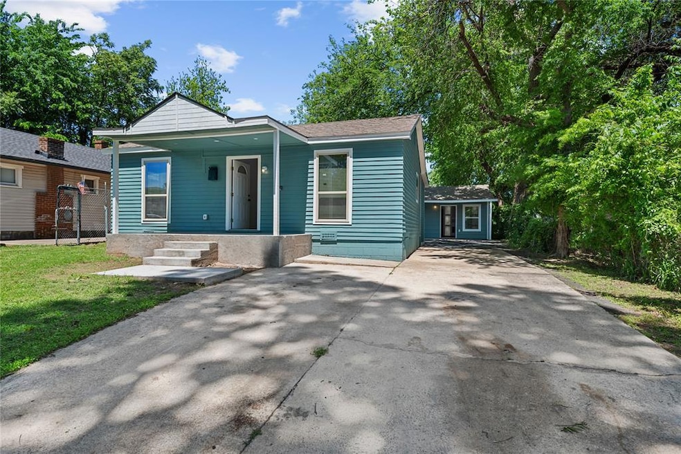 View of front of home featuring covered porch and 
