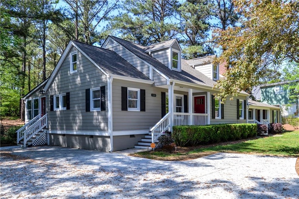 AN IMMACULATE RANCH COTTAGE ON ONE ACRE IN WOODSTO