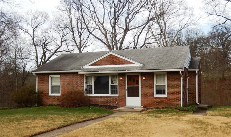 Welcome to 20 Longvue Circle.  Charming brick ranc