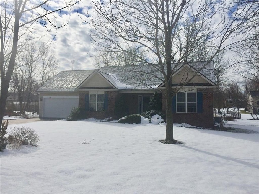 This custom built, 3 bedroom, stone front ranch ha