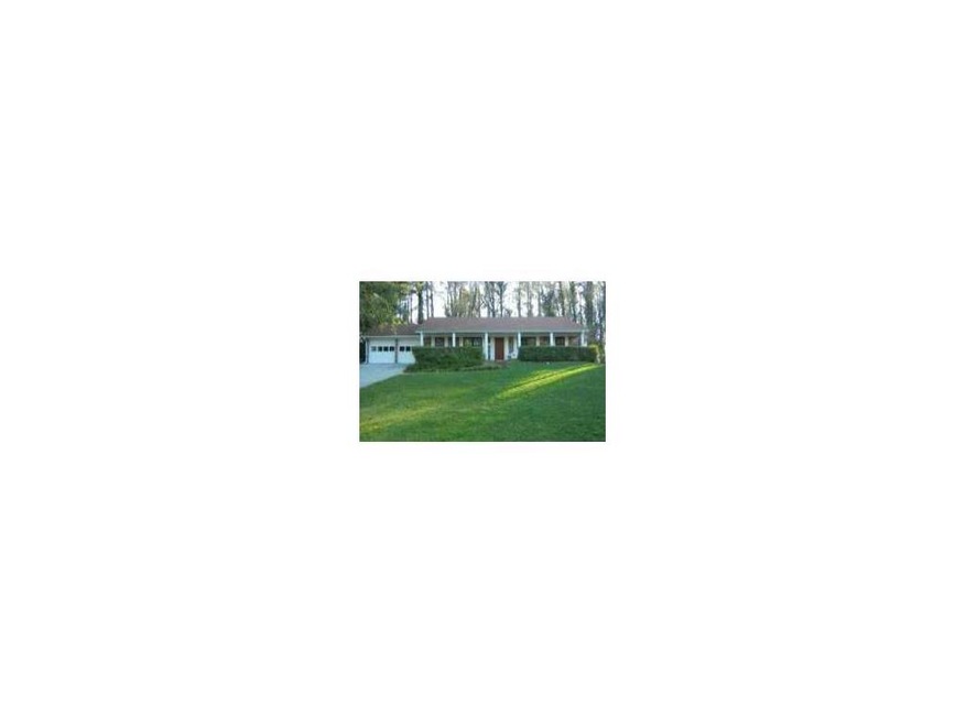 Exterior Front. Beautiful, well maintained landsca