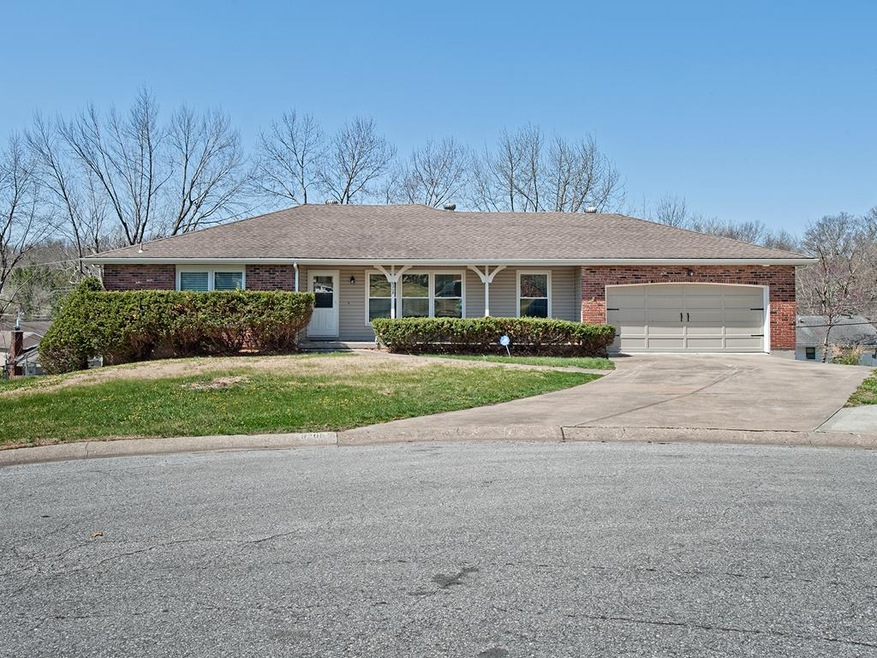 Front of House with Newer Windows and on Cul-de-Sa