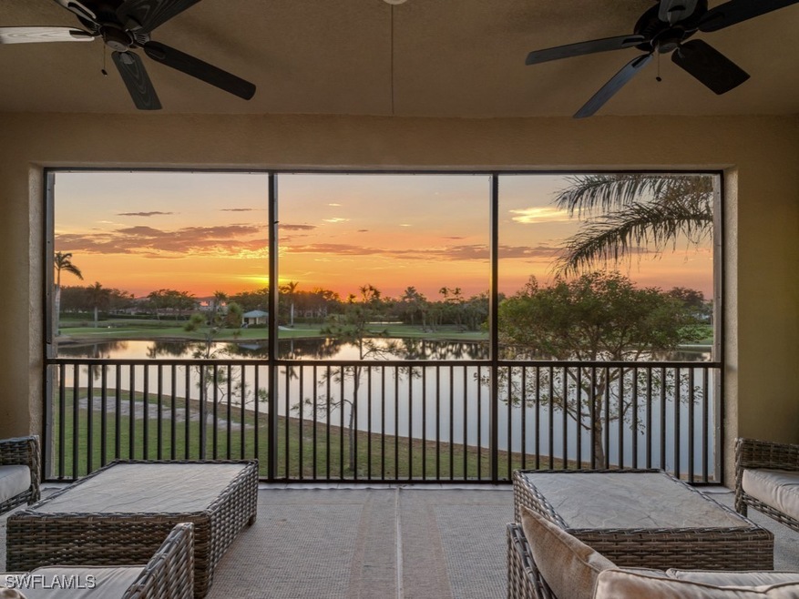 Screened lanai with water, golf course and sunset