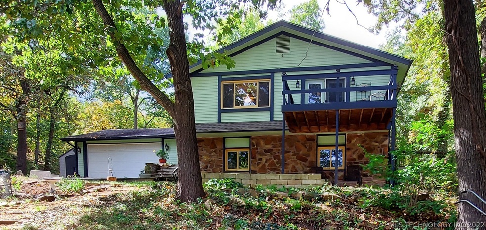 Front of home sloping front yard