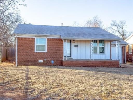 Single story home featuring a front yard