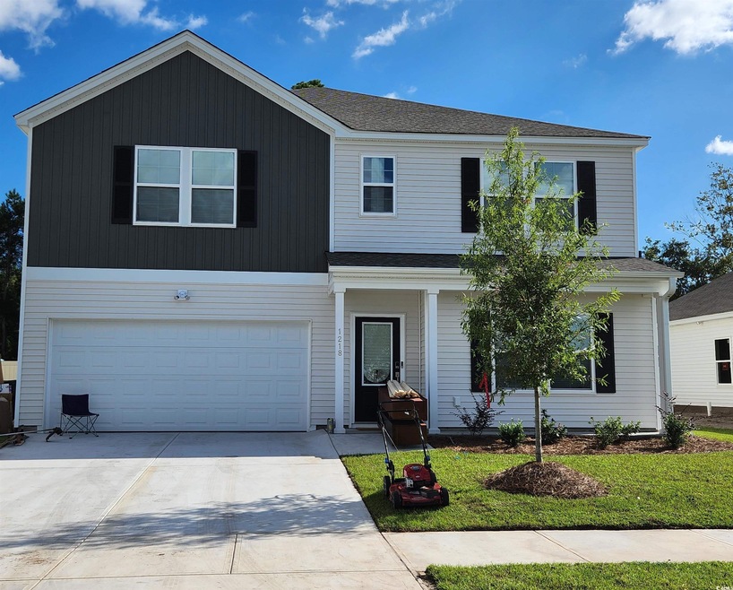 View of front of home with a garage