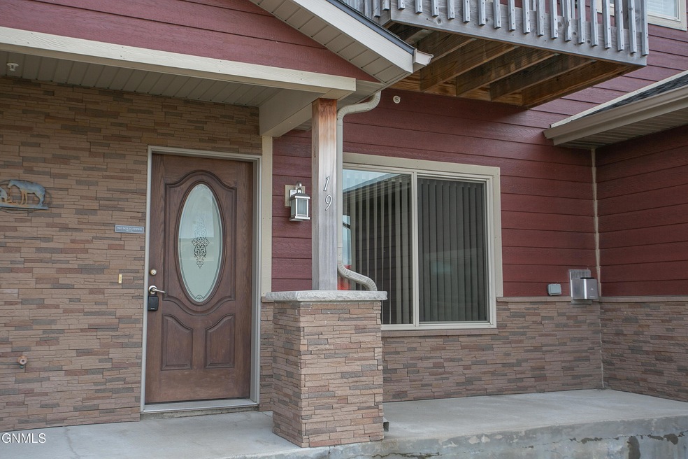 3512 33rd Ave W unit 19, Williston, ND 58801 - photo 1