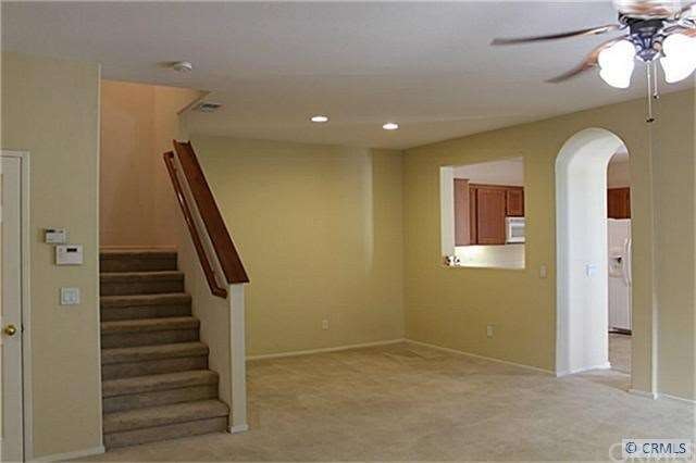 Living room, dining room looking into kitchen