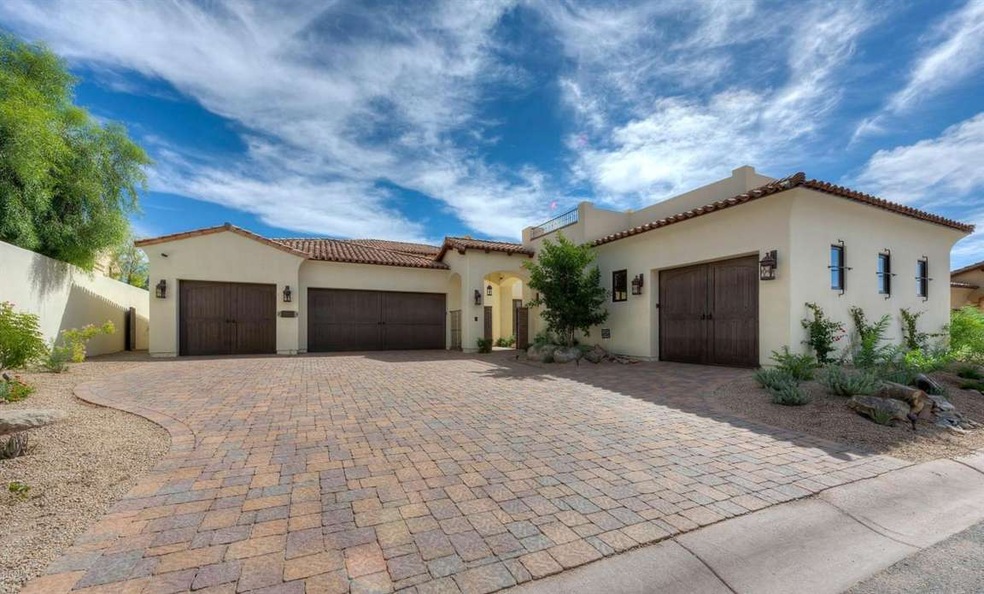 FRONT OF HOME AND DRIVEWAY