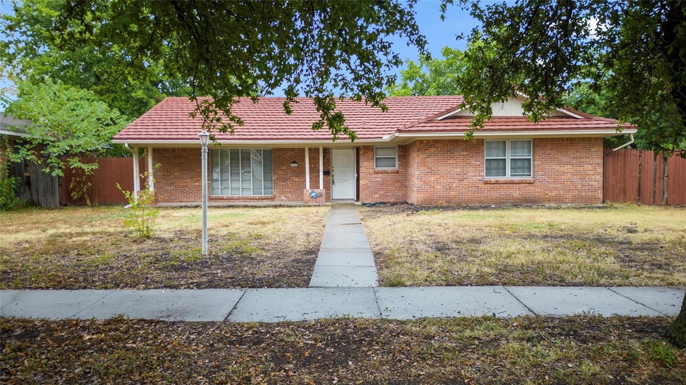 Single story home featuring a porch and a front la