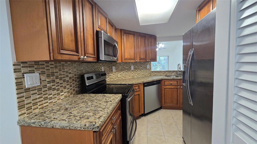 2815 N Course Dr unit 201, Pompano Beach, FL 33069 - photo 1