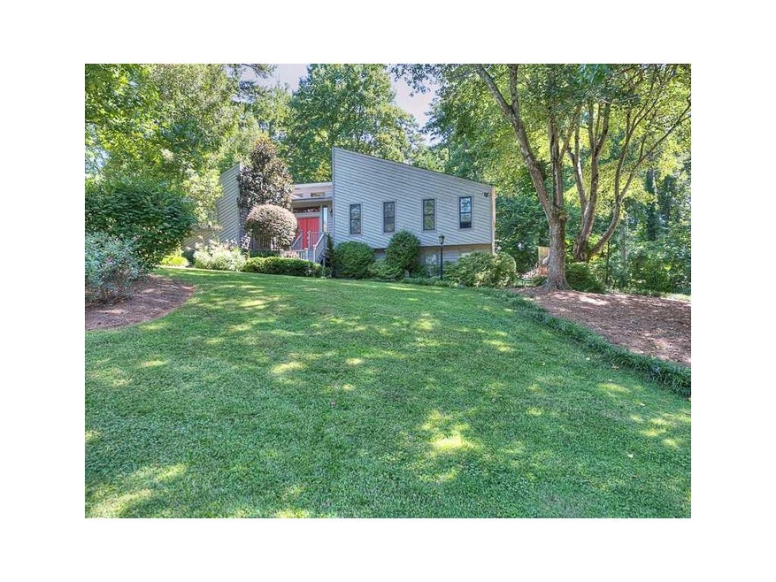 Exterior Front. Welcome Home!  Beautiful landscape