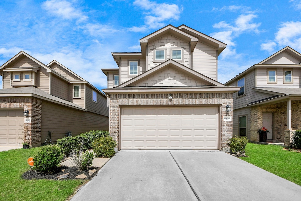Well, hello! Here's a charming two-story home with