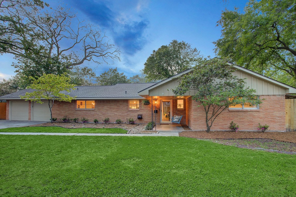 An unparalleled remodeled ranch style home in the