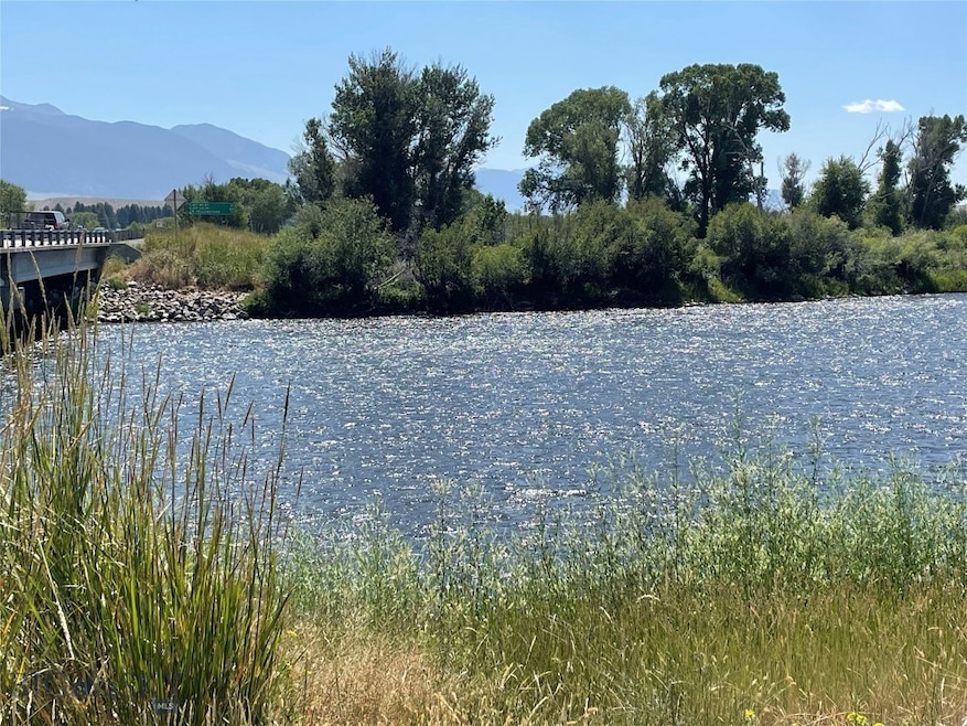 Parcel is across the river.