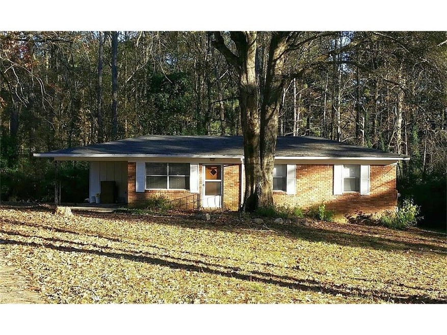 Front of all-brick home.