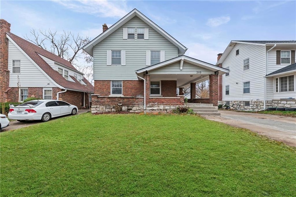 309 N Van Brunt Blvd, Kansas City, MO 64123 - photo 1