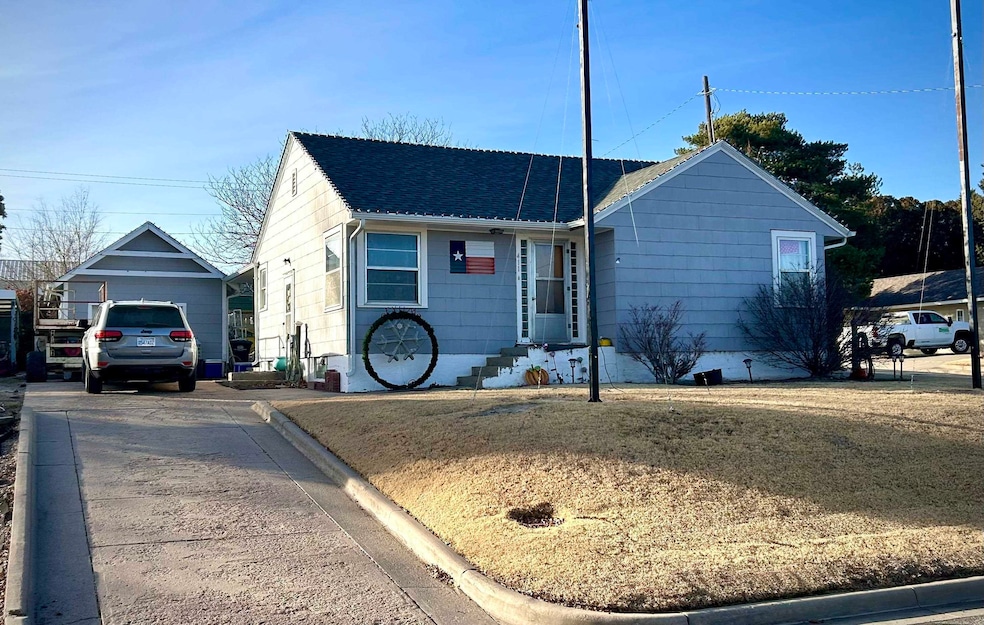 411 N Ash St, Cimarron, KS 67835 - photo 1