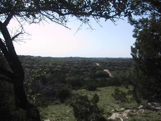 View : Looking West from hilltop. The roadway seen here is the access. This is freshly paved.