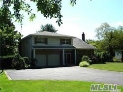 123 Harned Rd, ComMacK, NY 11725 - photo 1