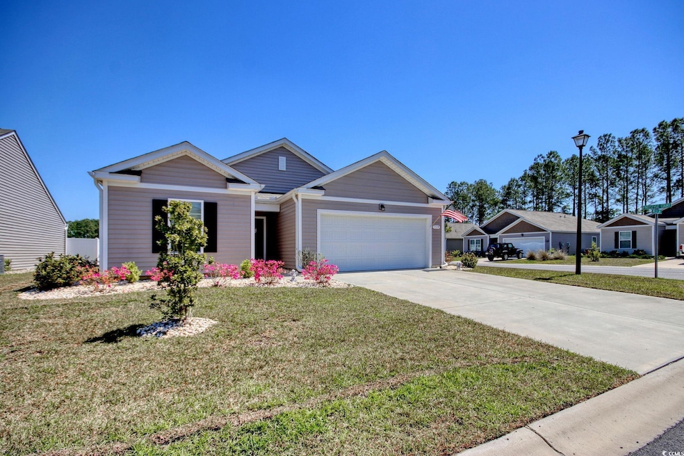 View of front of house with an attached garage, dr