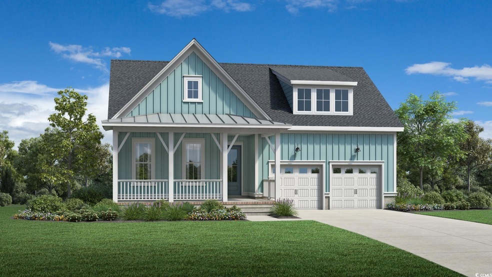 View of front of house with board and batten siding, a porch, concrete driveway, and a front lawn