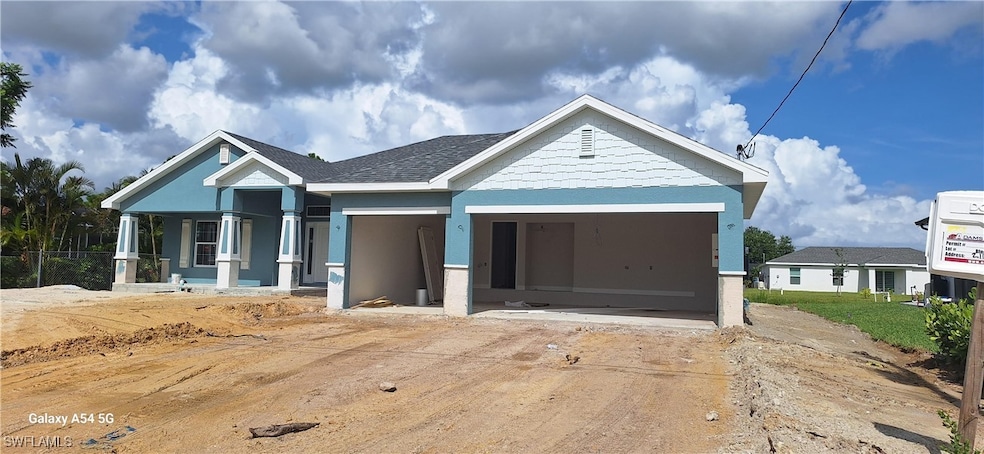 View of front of home featuring covered porch and