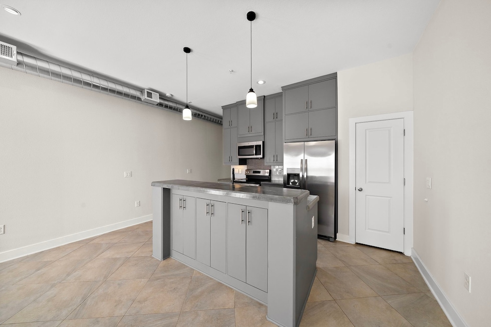 A warm and inviting kitchen designed for both styl