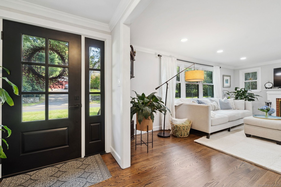 Gorgeous new doors, entryway and windows fill the 