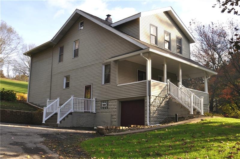 Exterior Front w/One Car Garage & Plenty of Extra 