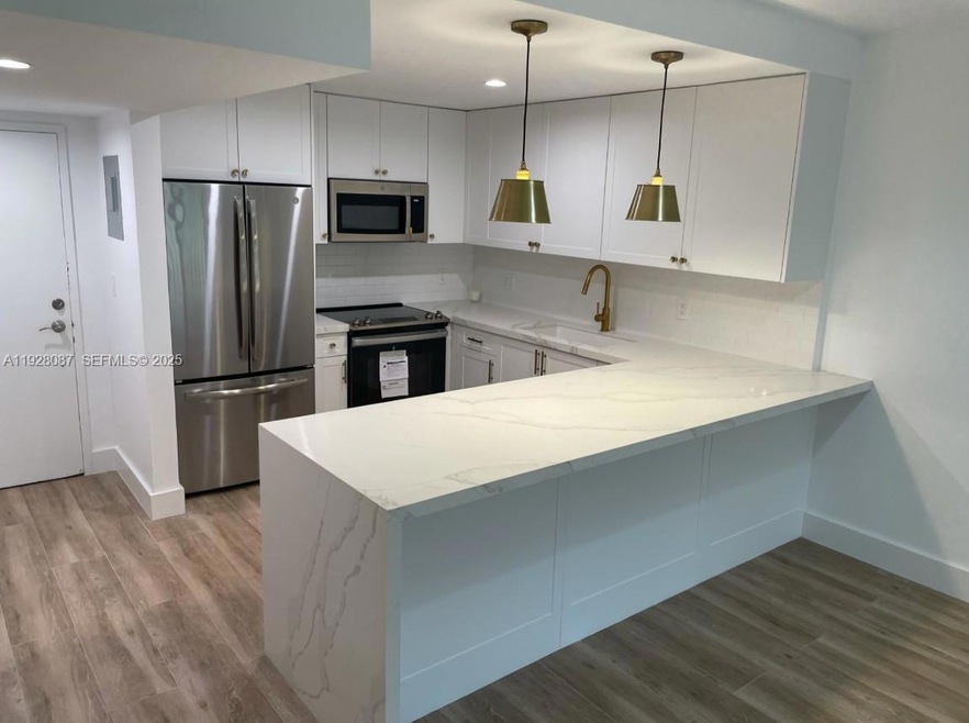 Waters Edge unit 101, Coral Gables, FL 33133 - photo 1